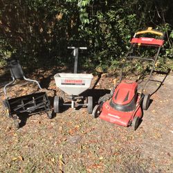 LAWN MOWERS AND SEEDER