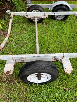 Axel with hubs, leaf springs & new wheels