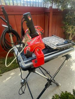 Husky THD950L 7 in. wet tile/stone saw with  stand.
