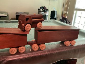 Mert’s toy wooden tractor trailer’s