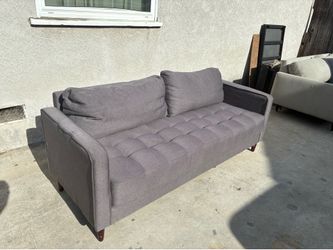 Delivery Available/  Dark Grey Couch