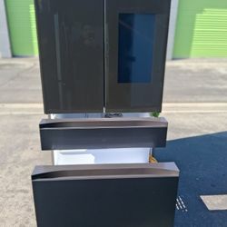 Samsung 4-door refrigerator with display screen, 36 inches wide by 68 and a half inches high and 29 inches deep.