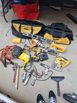 2 dewalt tool bags full of tools