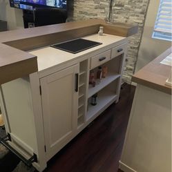 White Granite Bar And Cabinets 