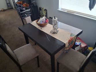 Small table with 3 chairs.