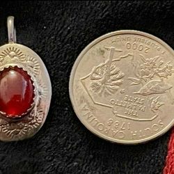 CORAL AND STERLING SILVER PENDANT -

