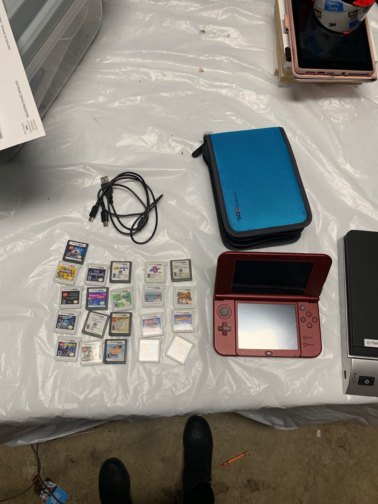 Nintendo 3DS with case, charger, and bundle of 21 games