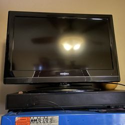 T.V. With  Built In DVD Player  26”