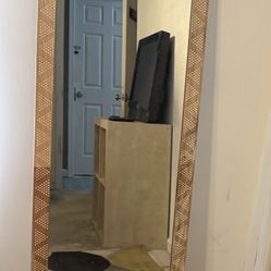 Beautiful Mirror Sitting In Vacant Room. 