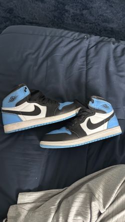 baby blue and black jordan’s ones