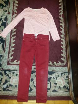 Girls Orange and White striped shirt and matching pants. Size 10-12. Both for $12.
