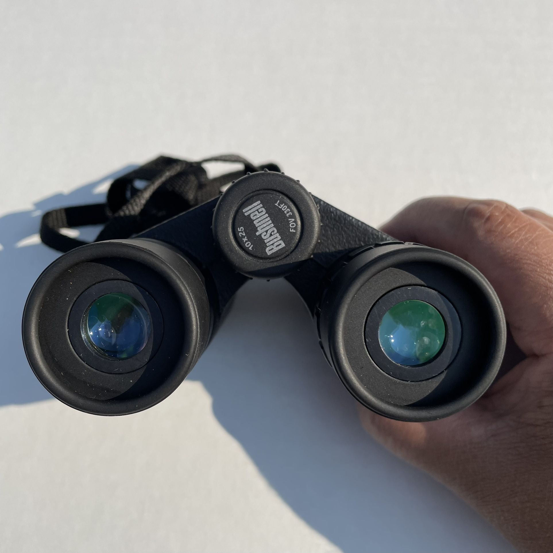 Bushnell binoculars sale 10x25 fov 330ft