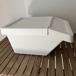 IKEA white plastic storage bin with folding lid