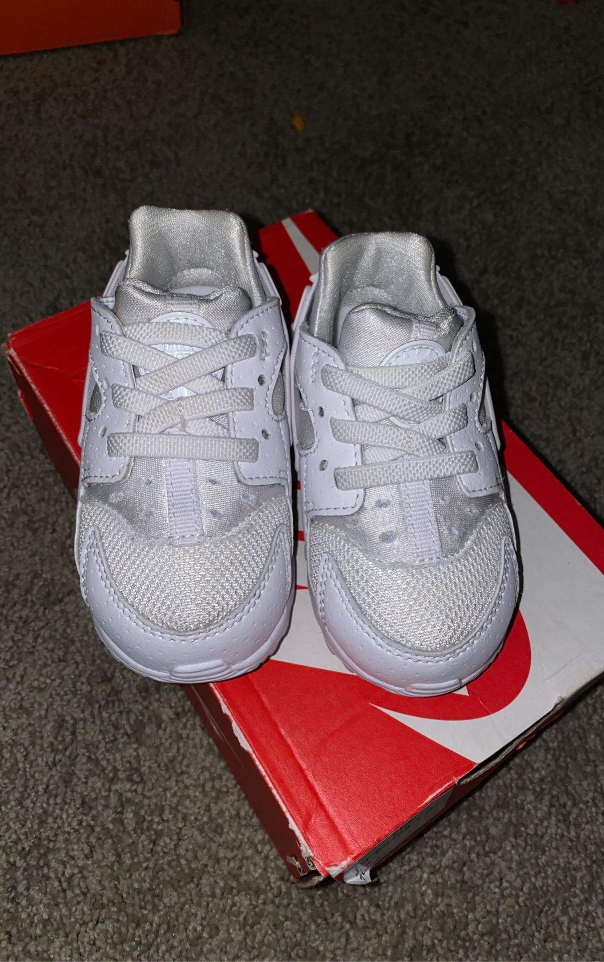 Baby Nikes size 5