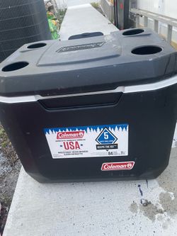 Black Coleman cooler 50quart xtreme wheeled