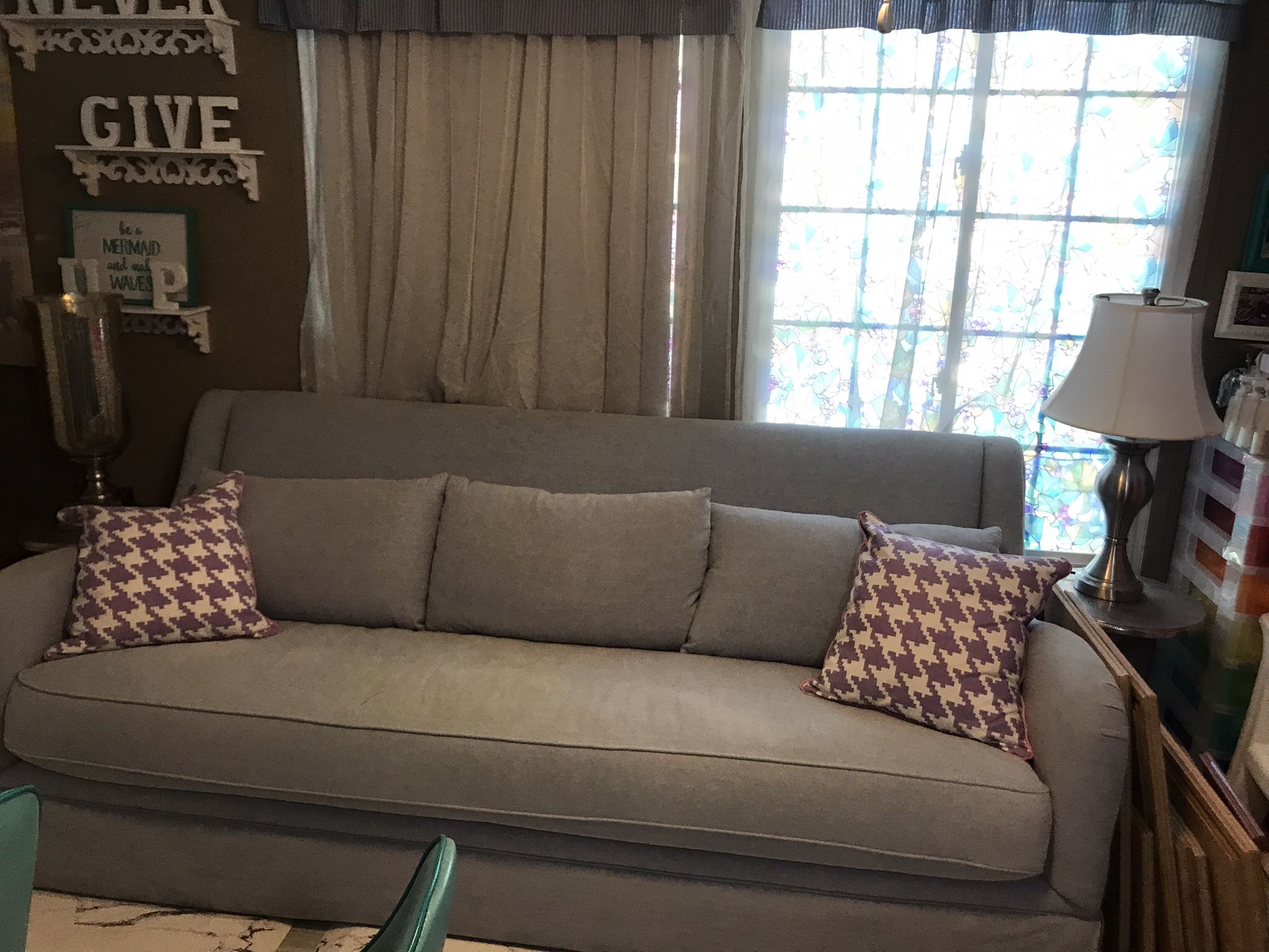Couch two end tables 2 lamps two lavender and white pillows all brand new items hardly ever used paid 2000 selling all of it for 600