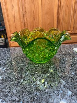 Vintage 1960’s  Tiffin Glass Williamsburg Empire Green Ruffled Fruit Bowl.  Size approximately 10 1/2 inches wide and 5 3/4 inches tall.  Preowned.  B