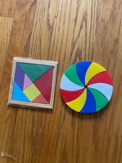 Kids Educational Puzzle Set – Wooden Tangram & Color Wheel Brain Teaser  Selling a set of 2 educational puzzle toys in good condition.  • Wooden Tangr