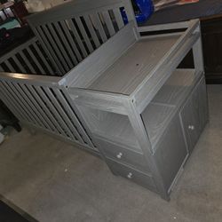 grey babycrib/changer