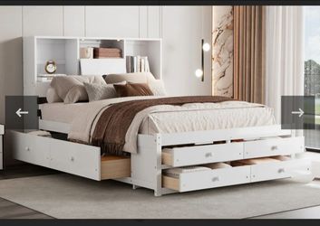 Queen size bed frame with 8 drawers.