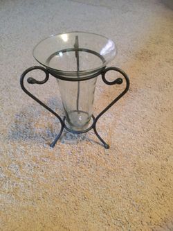 Clear glass vase with metal display