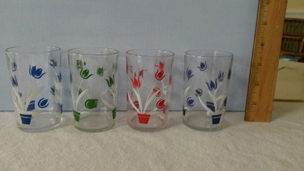 Swanky swig tulip glasses from mid century. Price is for all four.