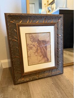 Ornate frame with Michelangelo print