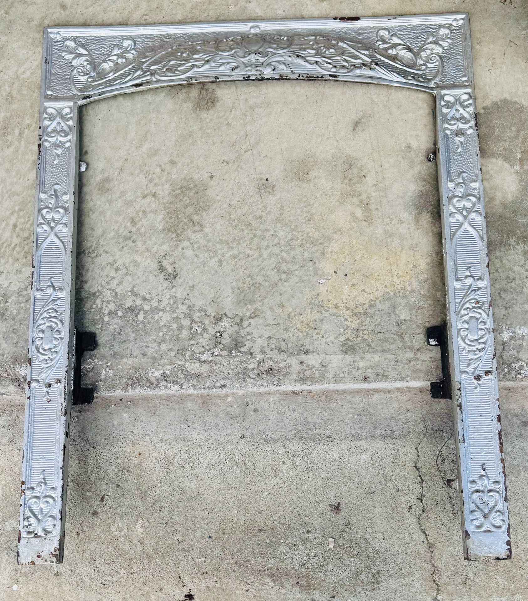 Vintage cast-iron fireplace surround