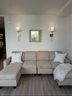 Modular sofa with ottomans