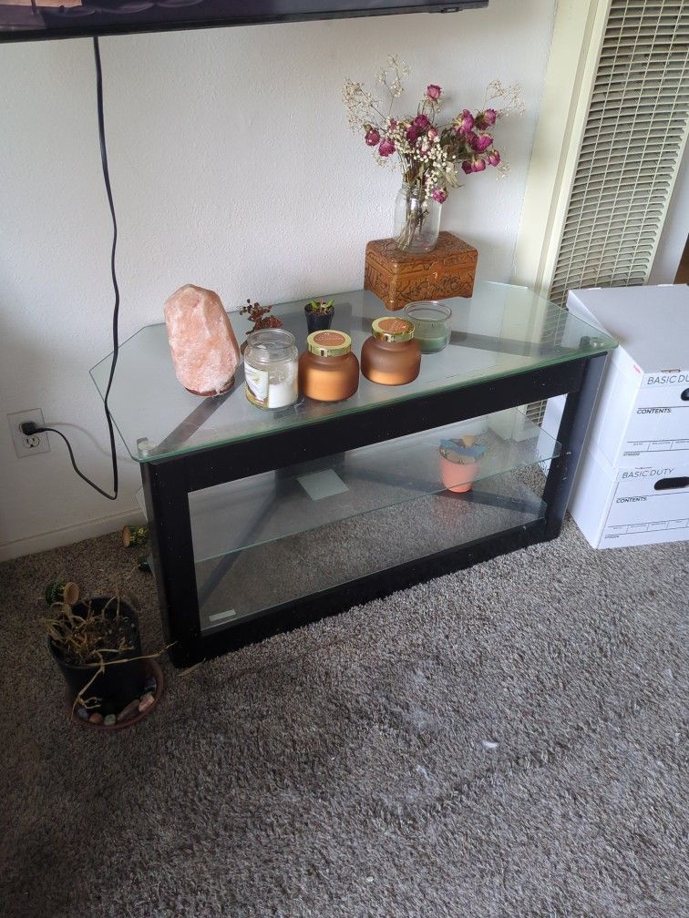 3 Tier entertainment Center / Shelf . NEED GONE MOVING