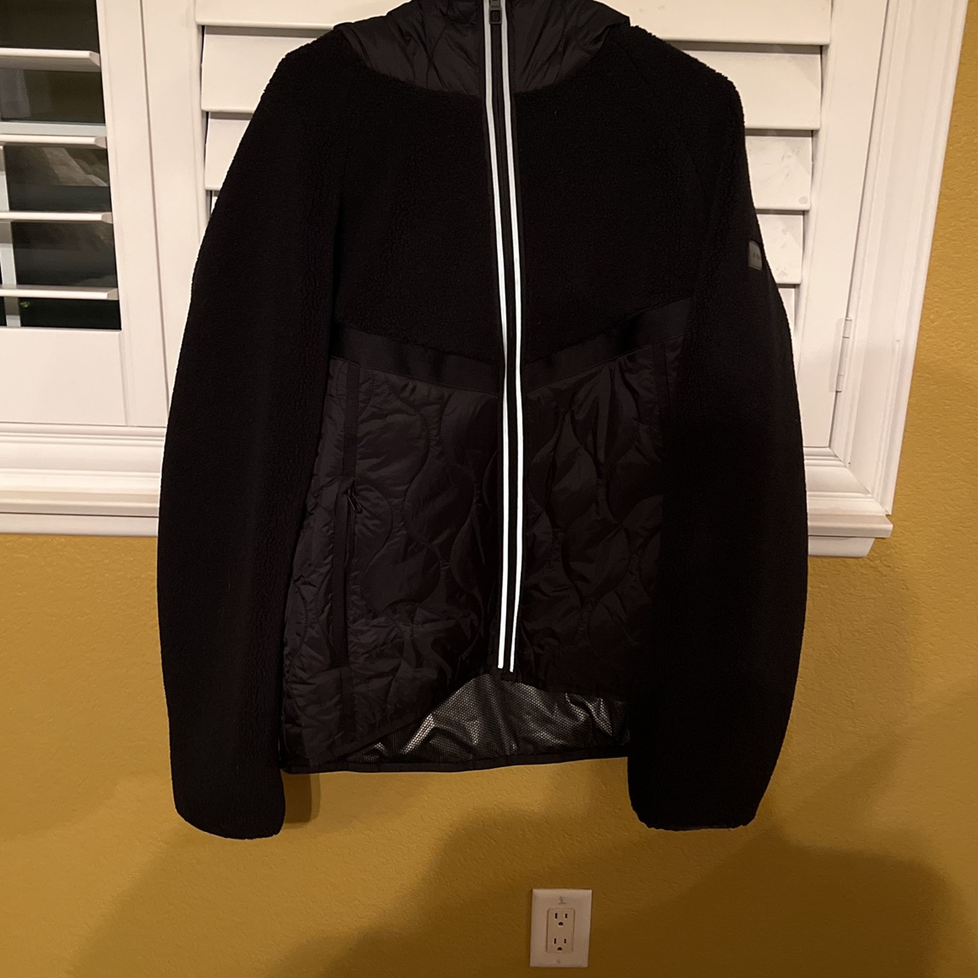Tumi size L hoodie, light jacket