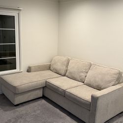 Beige Couch With Reversible Chaise