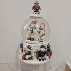 This Is A Lighted Snowman Snow Globe Music Box. It Does Light Up And The Music Works.