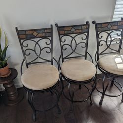 3 Counter Height Bronze Swivel Stools