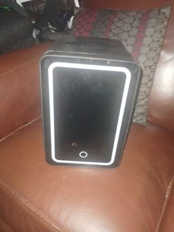 Mini fridge with LED lights in the door