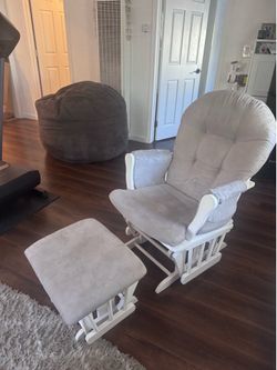 Rocking chair with rocking foot rest