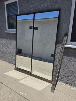Sliding closet mirror doors