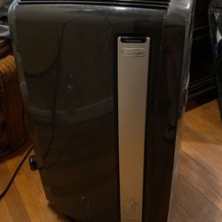 DeLonghi Portable Air Conditioner, 12,500 BTU, 480 Sq Ft, Built In castor wheels, remote control.