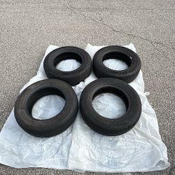 4 used tires, size 215/55R16