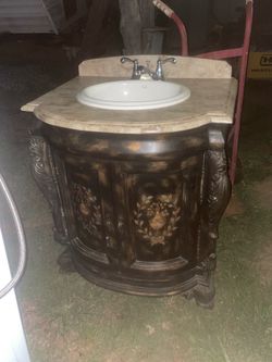 Ornate Bathroom Vanity with Marble Top and Sink
