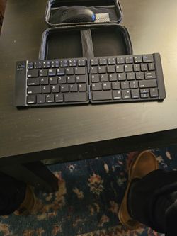 WIRELESS KEYBOARD,MOUSE TRABEL SET WITH A CASE BRAND NEW