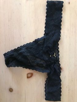 Black Victoria’s Secret thong panties