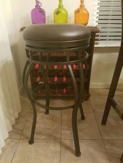 Dark brown Bar stool about 3 feet
