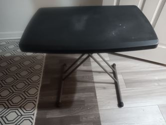 Selling 1 small black desk top. Has a faded spot and few marks as you can see in pictures. Still in good working condition. Selling for $15.