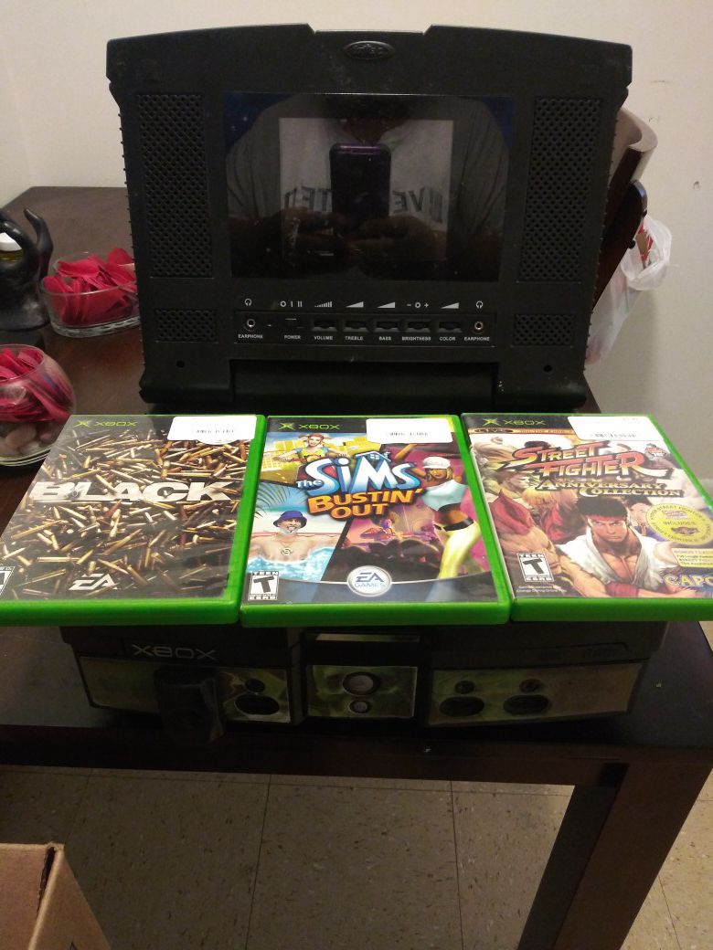 Xbox with screen and games