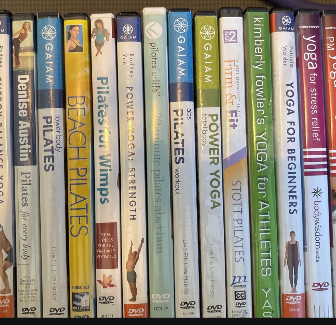 25 Workout DVD’s 16 Pilate/ Yoga & 9 Regular Wko DVD’s ! All New Condition!