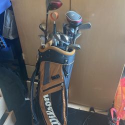Assorted Golf Clubs And Bag