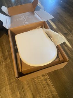 Tushy Toilet Seat