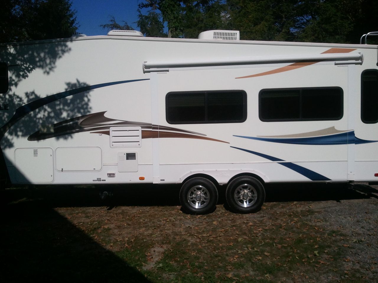 Photo 2010 Sundance Fifth Wheel Book Price $17,000 Asking $11,000 Firm Excellent Shap 8 Slide out Automatic Awning Pullout contact info removed