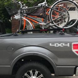 Yakima Truck Bed Bike rack.  Set up for two bikes.  Includes truck bed rails. 